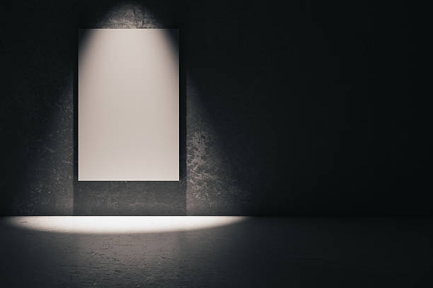 istock White poster in dark room 522546782