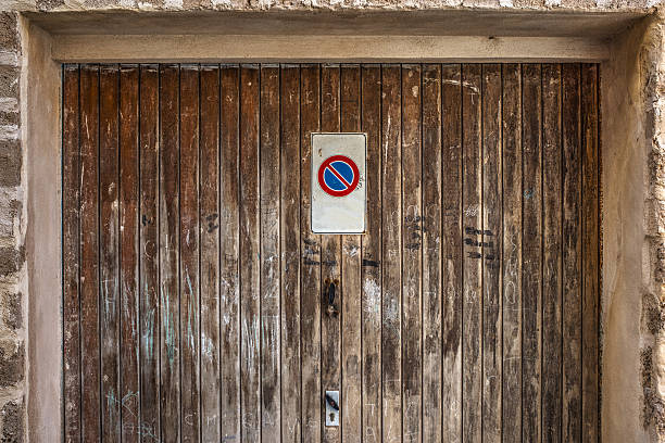 istock garage door with no parking sign 522549954