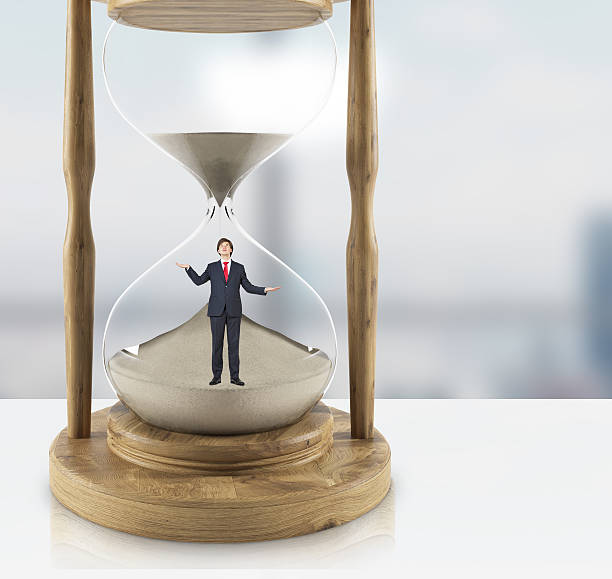istock Uncertain businessman hourglass 522549968