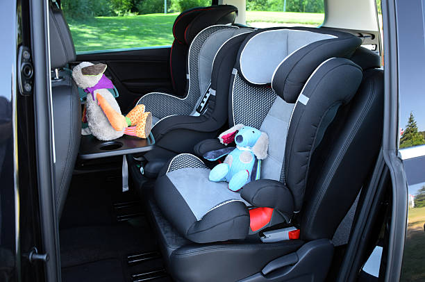 Seats for children in minivan stock photo