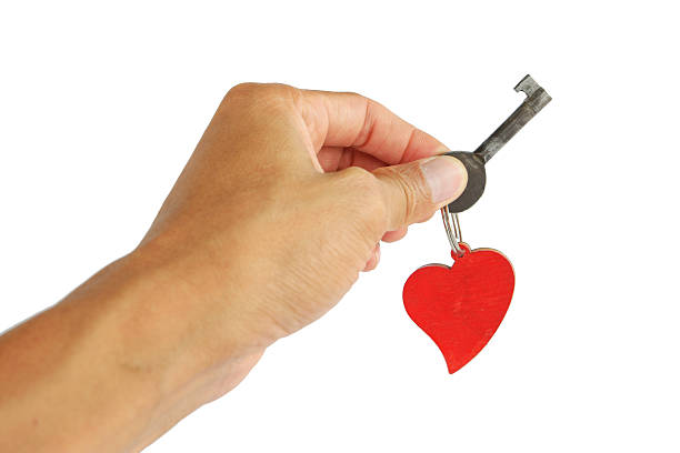 istock Hand with heart  Key to the heart 522553034