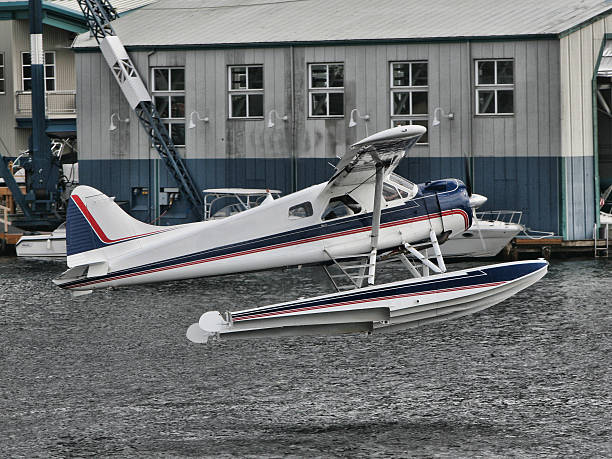 seaplane comes in for landing stock photo