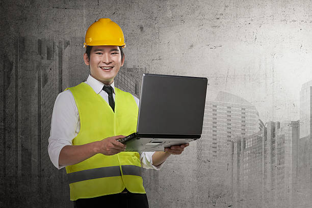 istock Asian engineer wearing safety vest 522555514