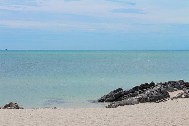 istock The beach and sea with rocks 522558308