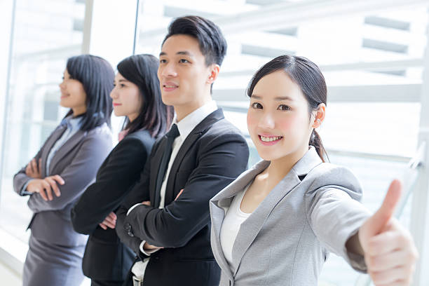 istock business team show thumb up 522558412