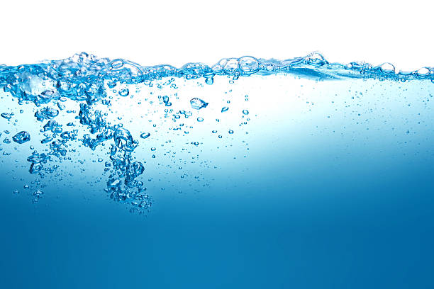 istock Close up blue Water splash with bubbles on white background 522559026