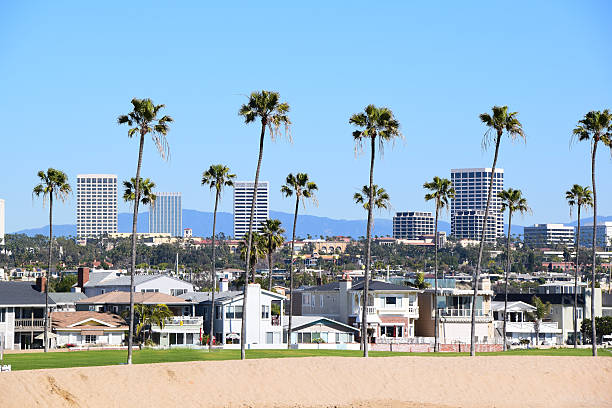 Orange County, California The beautiful coastline of Newport Beach, Southern California on a clear summer day. Newport Beach is a community in Orange County, California. newport beach california stock pictures, royalty-free photos & images
