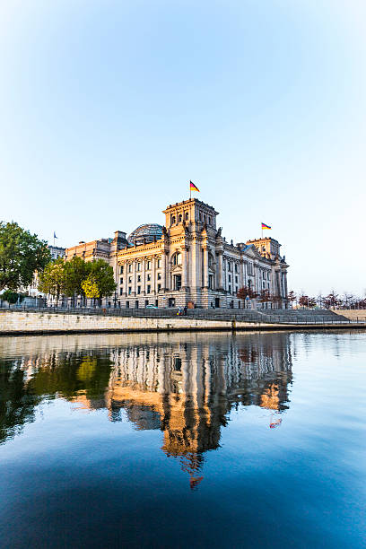 istock reichstag (bundestag) with reflection in spree river in berlin 522560921