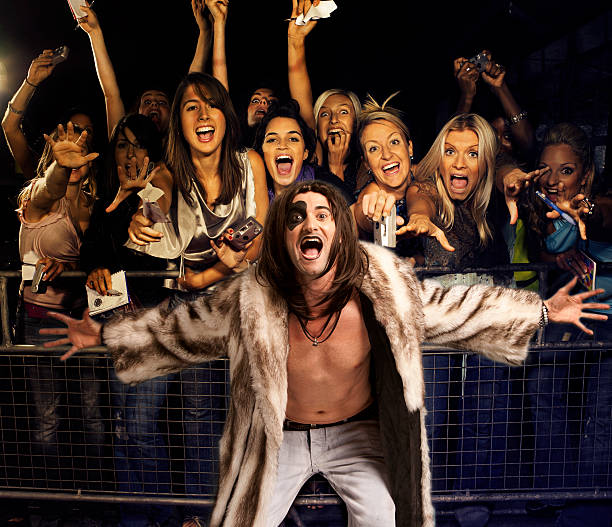 istock Young rock musician in fur coat 522561909