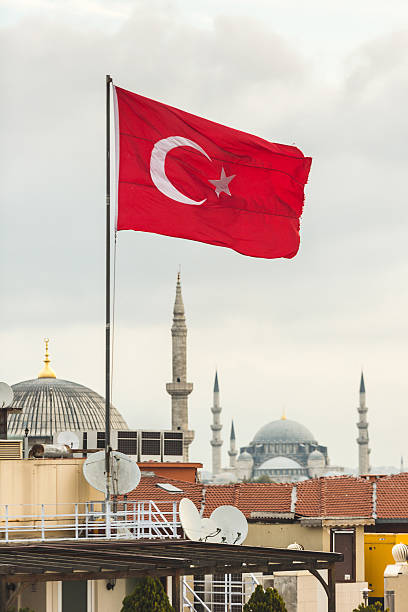 istock Turkish Flag and Istanbul Rooftops View with Mosque on Backgroun 522564481