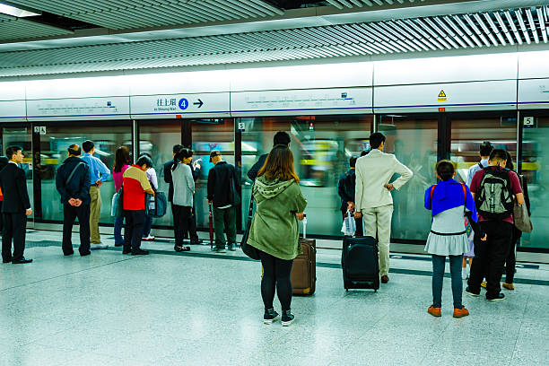 istock People waiting for metro train in Hong Kong 522565463