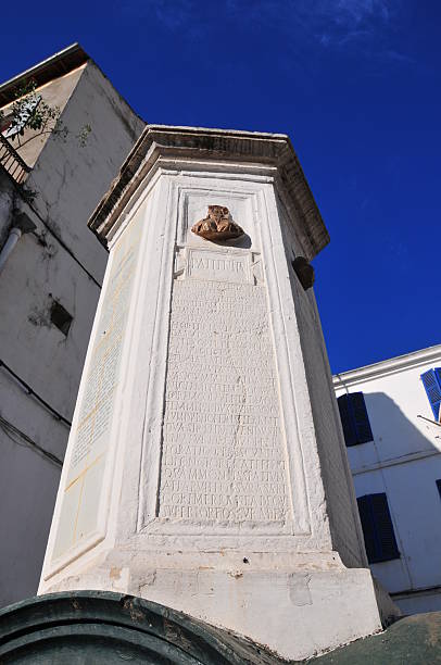 Béjaïa, Algeria: Roman column Béjaïa / Bougie, Kabylia, Algeria: Latin inscription - column celebrating the Toudja-Bajaia Roman aqueduct - City Hall square  kabylie stock pictures, royalty-free photos & images