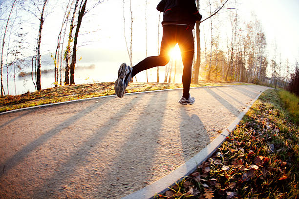 istock Man running at autumn during sunrise 522565903
