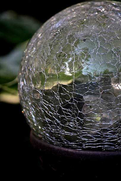 istock Cracked Glass Globe Close Up 522566935