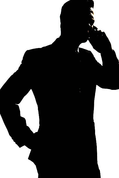 istock Silhouette of a man on the phone 522567215