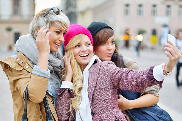 istock Young friends together taking selfies 522578721