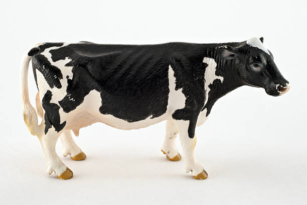 istock Toy cow isolated on a white background 522580245