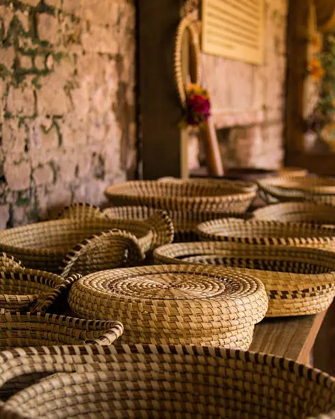 Hand made sweetgrass baskets on tbale at Boone Hall Plantation in Charleston, South Carolina.