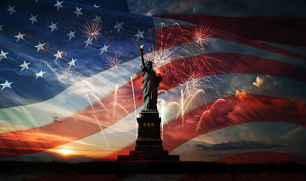 Independence day. Liberty enlightening the world Statue of Liberty on the background of flag usa, sunrise and fireworks fourth of july stock pictures, royalty-free photos & images