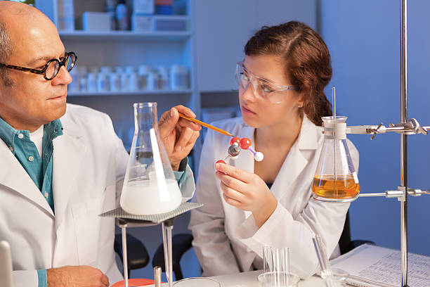 istock Student Scientist Working with Teacher in Chemistry Laboratory Horizontal 522582395