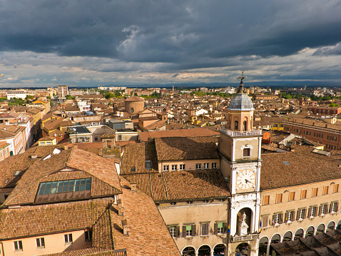 Cityscape of Modena on sunshine after storm, medieval town situated in Emilia-Romagna, Italy