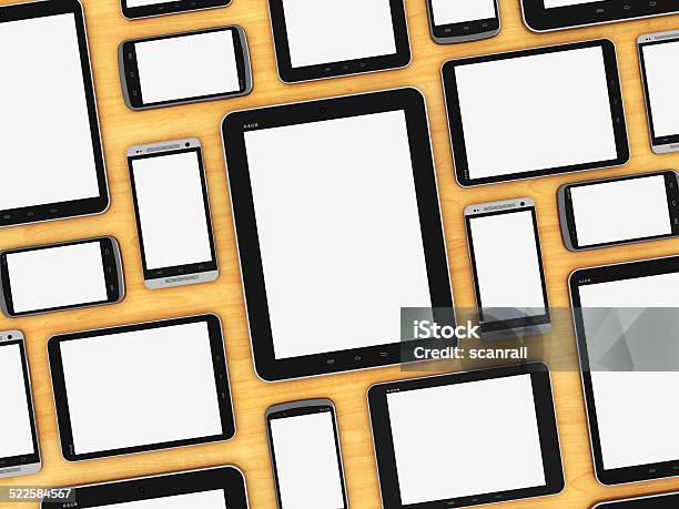 Blank Mobile Devices On Wooden Table Stock Photo - Download Image Now - Pattern, Smart Phone, Black Color