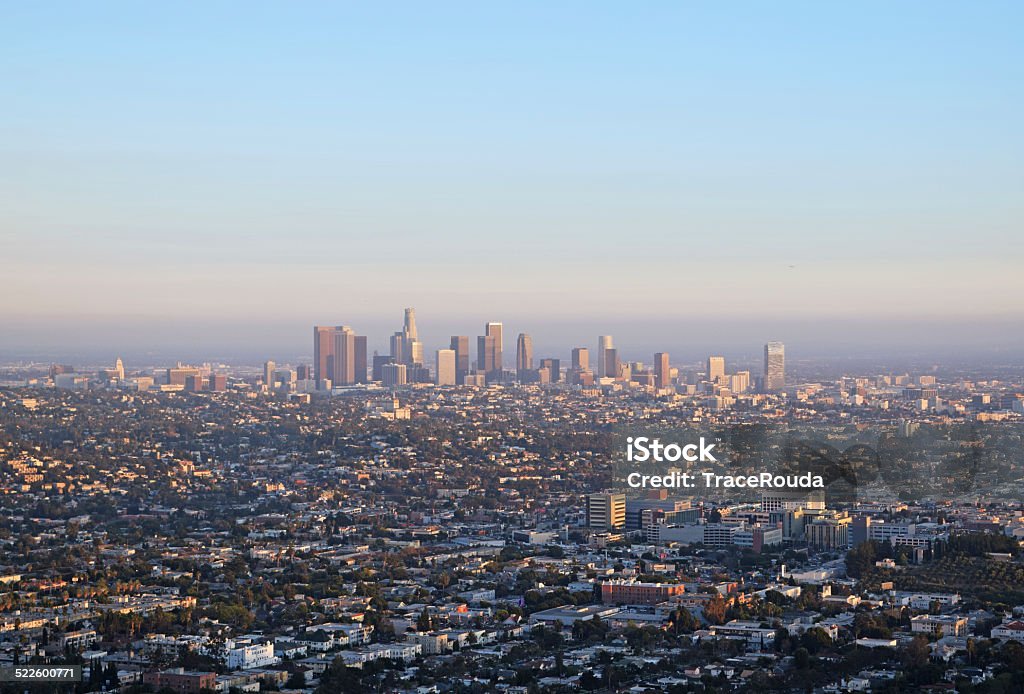 Downtown Los Angeles at Sunset The sun sets in the City of Angeles on a summer evening.  Aerial View Stock Photo