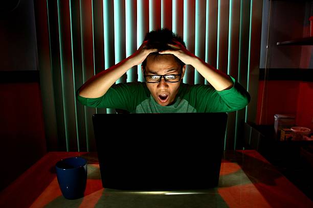 istock Young Teen acting surprised in front of a laptop computer 522601069