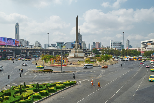 Bangkok, Thailand - February 26, 2014: View on the Victory Monument the big military monument in Bangkok on 14 October 2006. The monument has been established in June 1941 to mark a victory in war with Frenchmen. Bangkok, Thailand - February 26, 2014