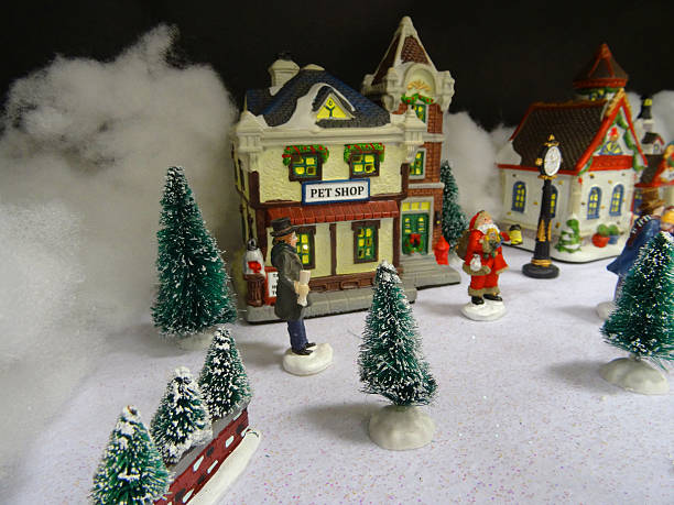 Image Of Model Christmas Village With Miniature Houses People Petshop Stock  Photo - Download Image Now - iStock