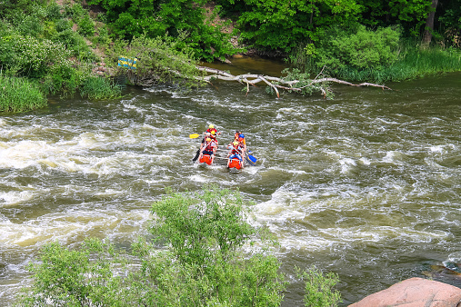 Nikolaev, village Grushevka, Ukraine - May 23, 2014:  Rafting tourists with an experienced instructor on the river Southern Bug