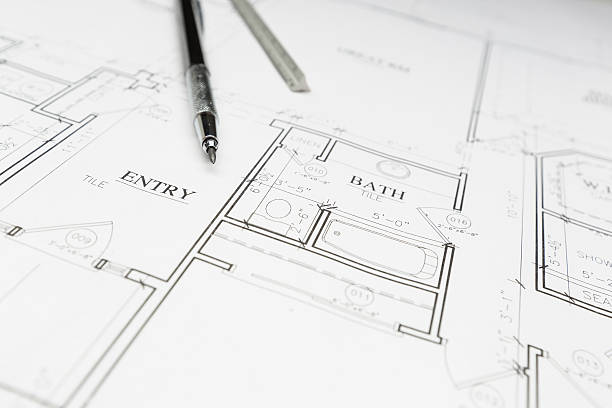 istock Engineer Pencil and Ruler Resting on House Plans 522620712