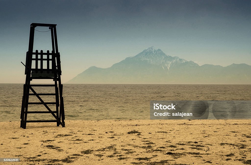 Baywatch tower on the beach Baywatch tower in Halkidiki, Greece with mount Athos on background Bay of Water Stock Photo