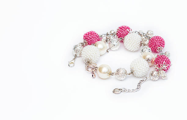 istock Pink and white beaded bracelets 522622310