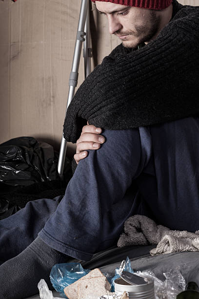 istock Sad homeless man on the street 522622573