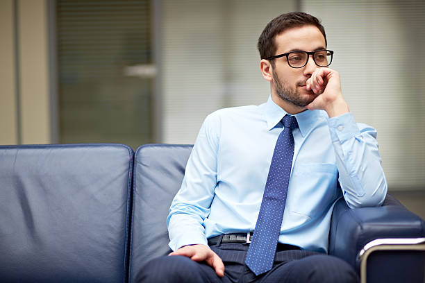 istock Handsome businessman in thought 522622806