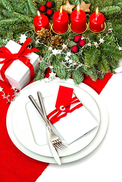 istock christmas table place setting decoration with four candles 522623657
