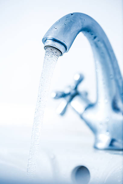 istock Running water tap closeup 522626396