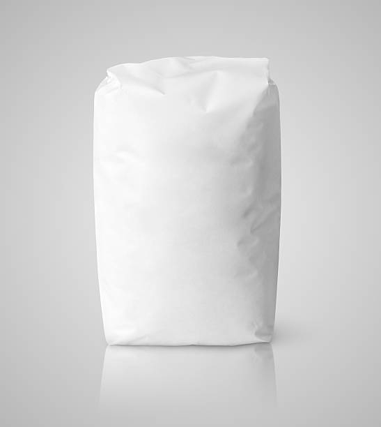 istock White blank paper bag package of flour on gray 522629048