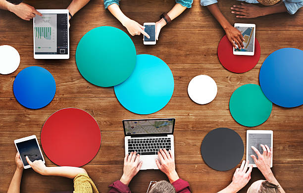 istock Diverse People Hands Team Busy Devices Concept 522629628