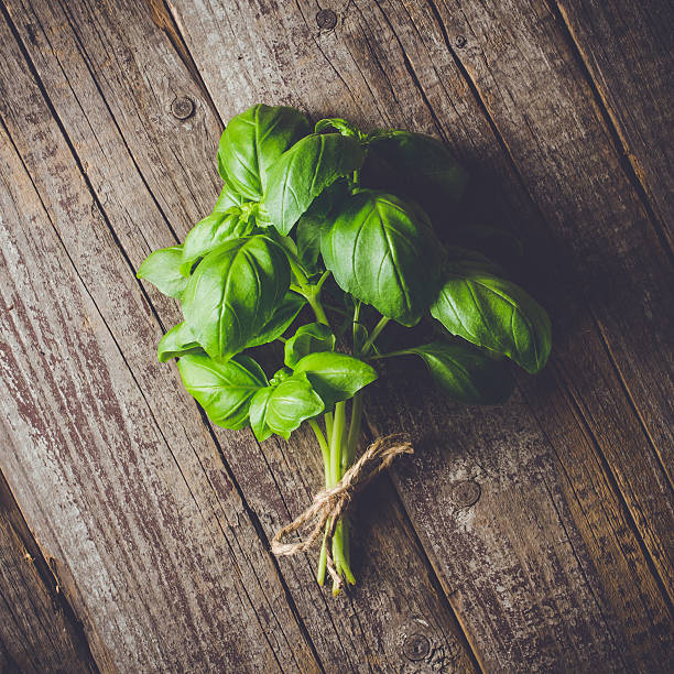 istock Fresh herbs from garden on wooden table 522632570