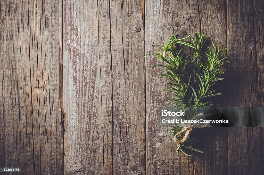 Fresh herbs from garden on wooden table Fresh herbs from garden on an old table Backgrounds Stock Photo