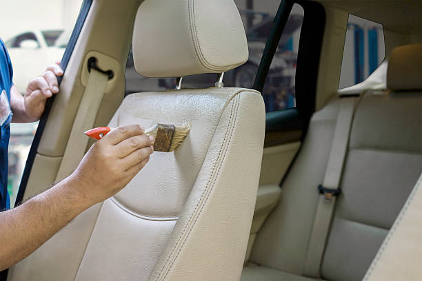 istock Hand cleaning the car seat 522634678