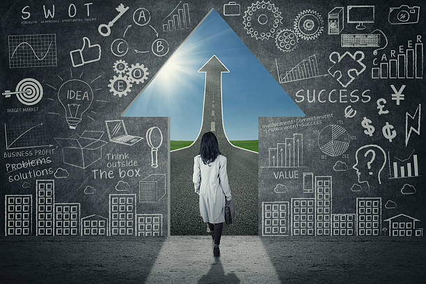 istock Female worker walks on the success door 522635372