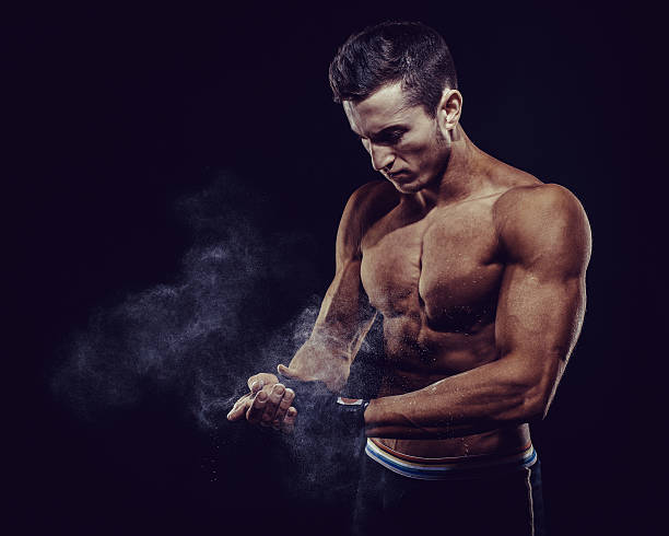 istock MMA Fighter Preparing Bandages For Training 522637988