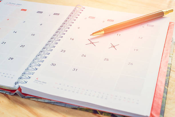istock Notebook and pen with glasses calendar format 522638118