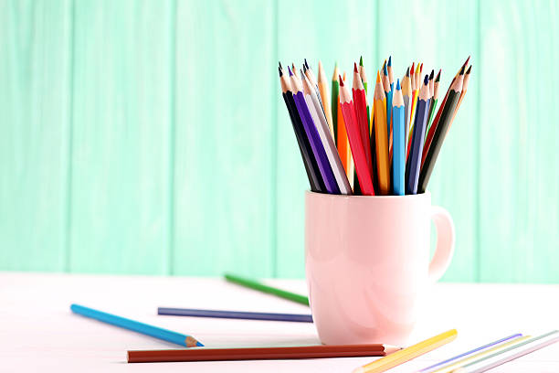 istock Drawing colourful pencils on a wooden background 522638852