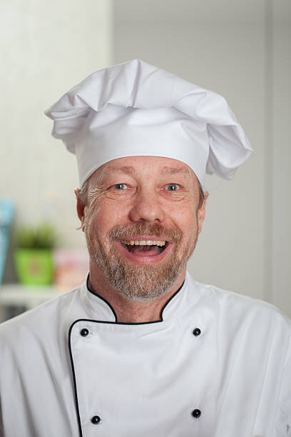istock Cook in the White Cap laughs 522639060
