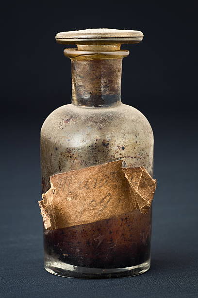 istock Old chemical bottle with wrinkled label 522639824