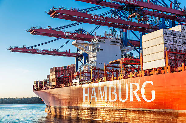 Container Ship in Hamburg Container Ship, loading in the Harbour of Hamburg hamburg germany photos stock pictures, royalty-free photos & images